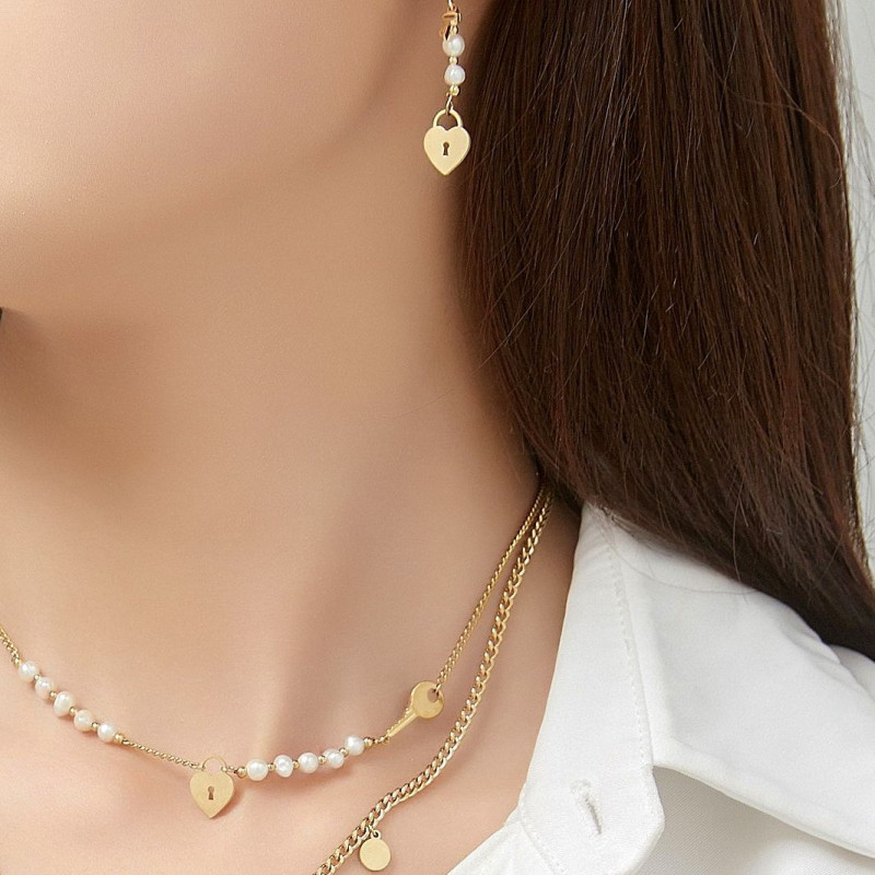 Urmila - Boucle d'oreille dorée